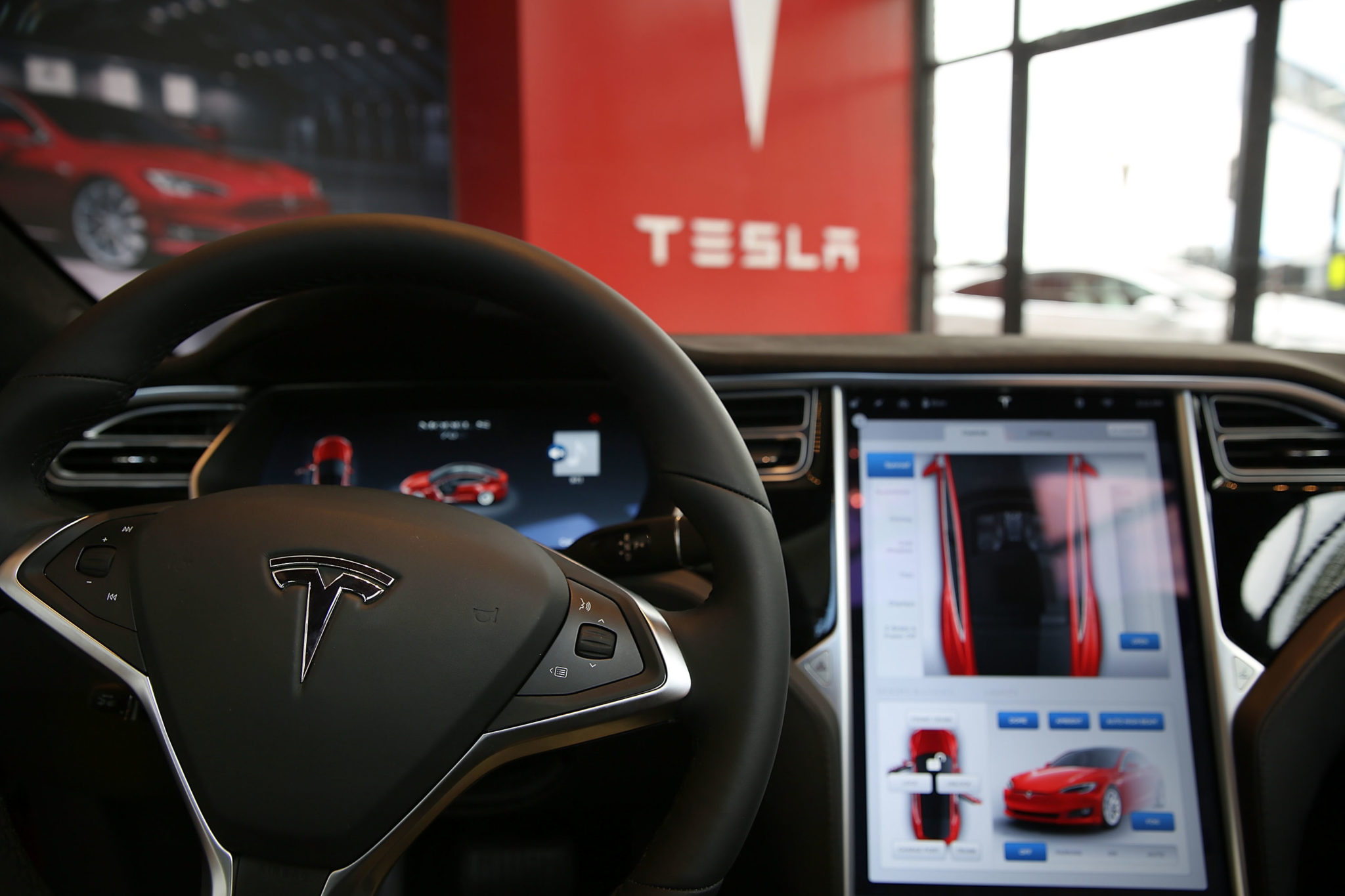 tesla owners will see a redesigned user interface with autopilot v80