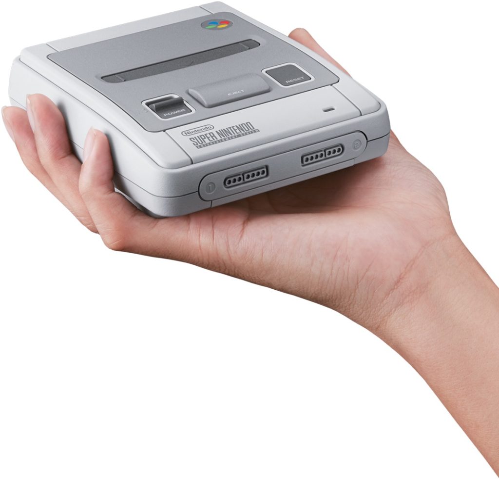 hand holding snes 2x