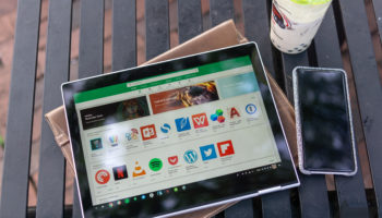 Pixelbook in tablet mode chromebook with phone and tea hero