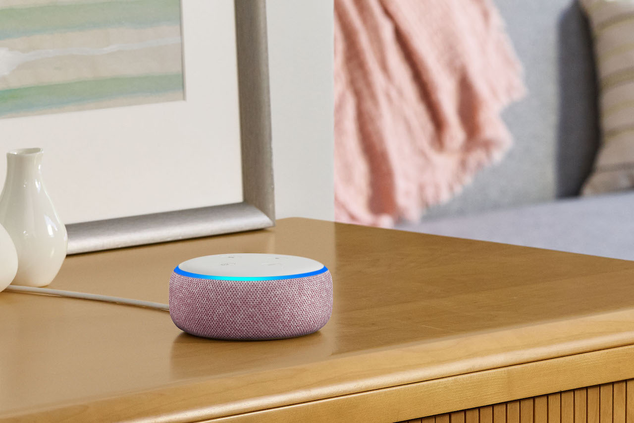Amazon Echo Dot Plum on side table