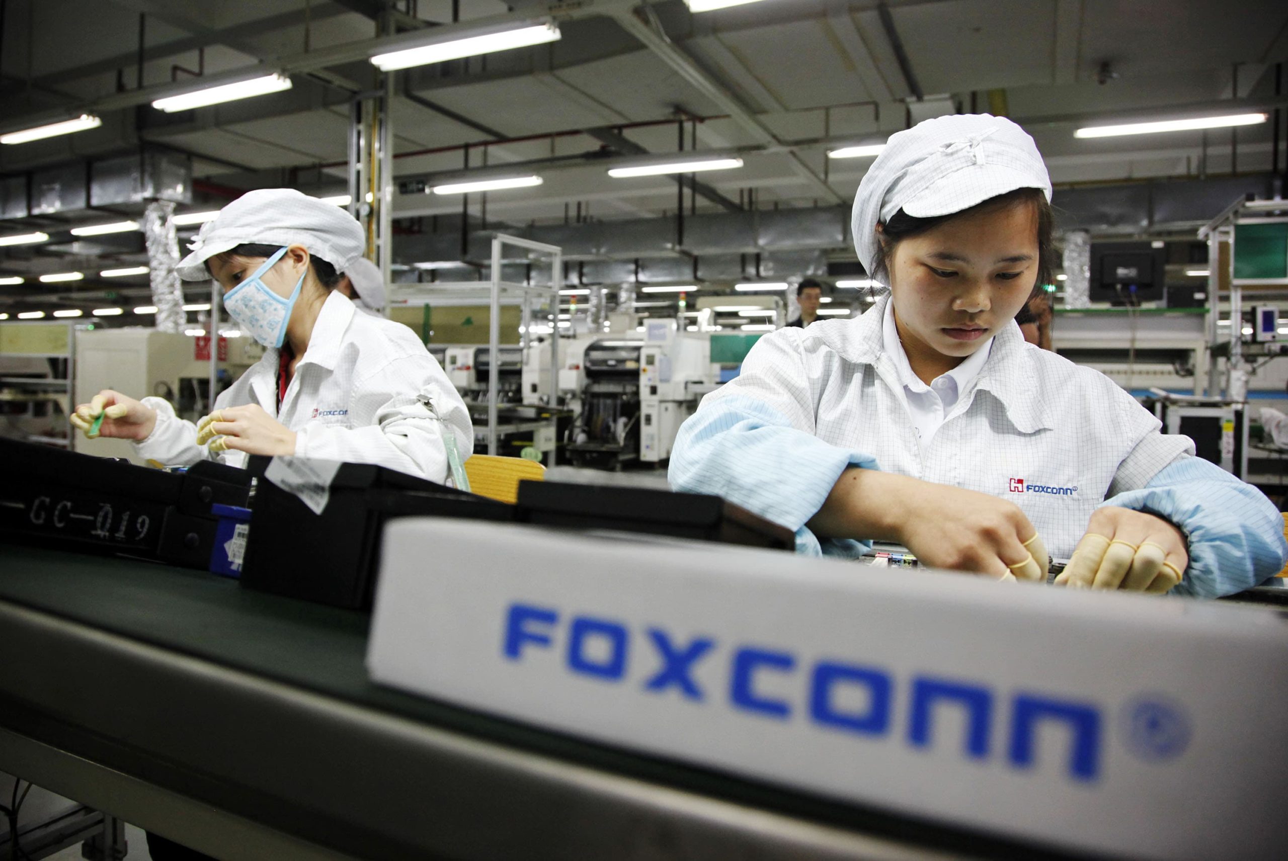 100642777 foxconn worker assembly line gettyp scaled