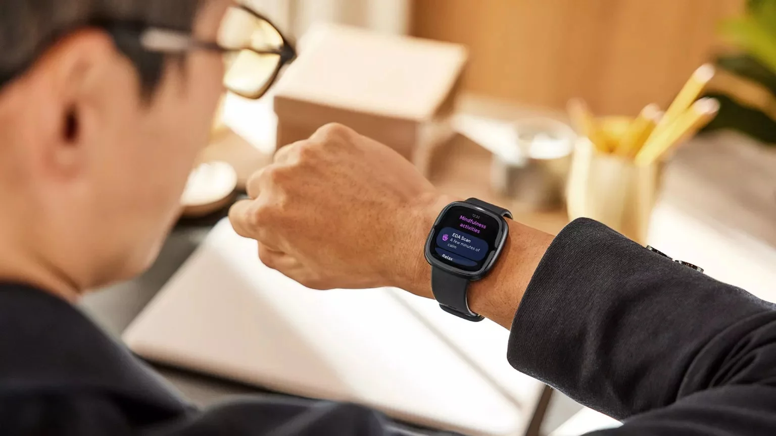 Fitbit Sense 2 on Mans Wrist Sho jpeg