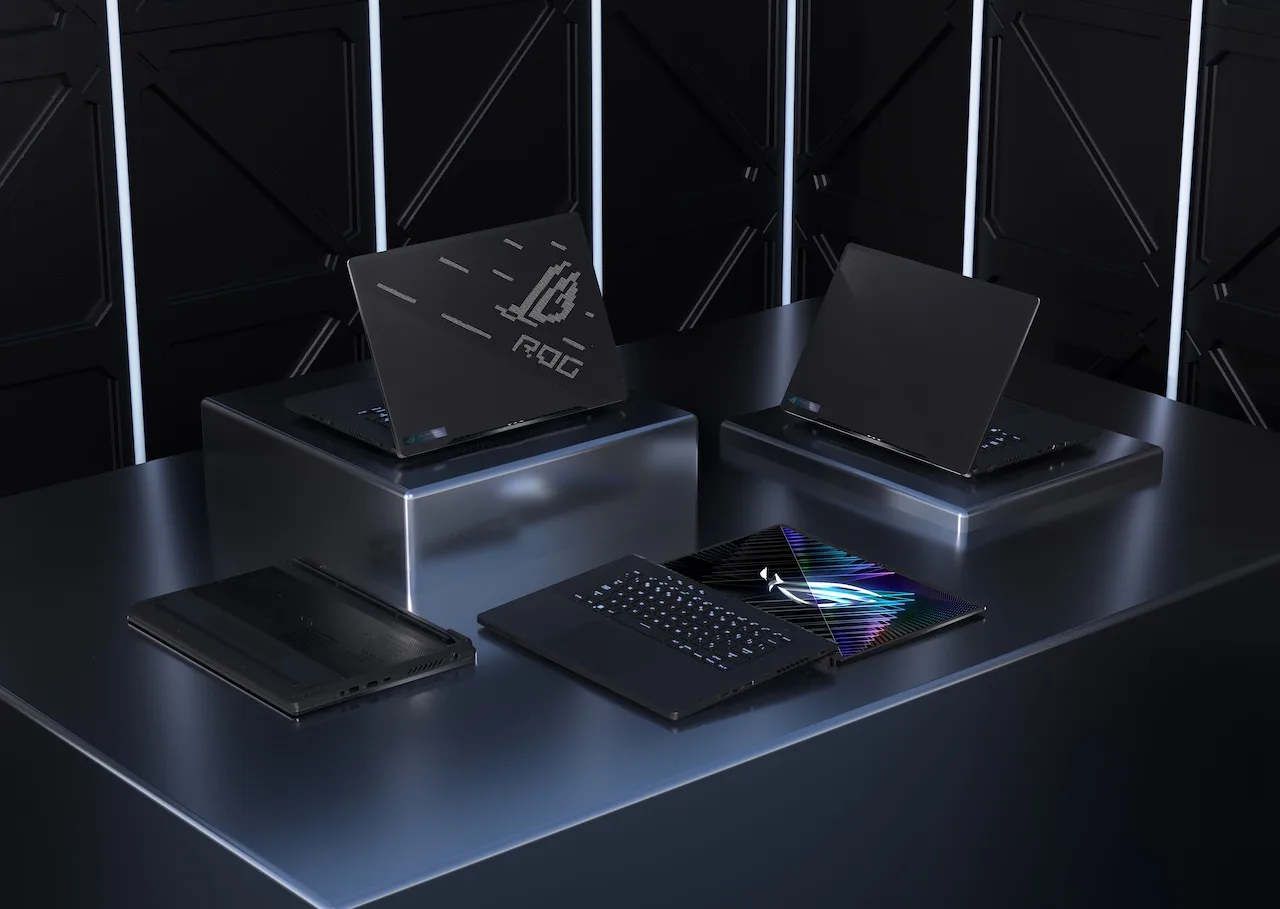 ROG Zephyrus M16 Four Zephyrus M16s arranged on three pillars of differing heights with the lid closed half opened and fully opened jpg