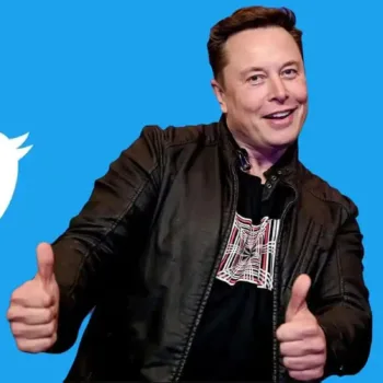 Elon Musk with Twitter logo