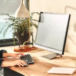 A female works on her Acer deskt