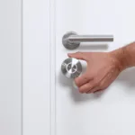 Nuki Smart Lock Ultra on white door Web