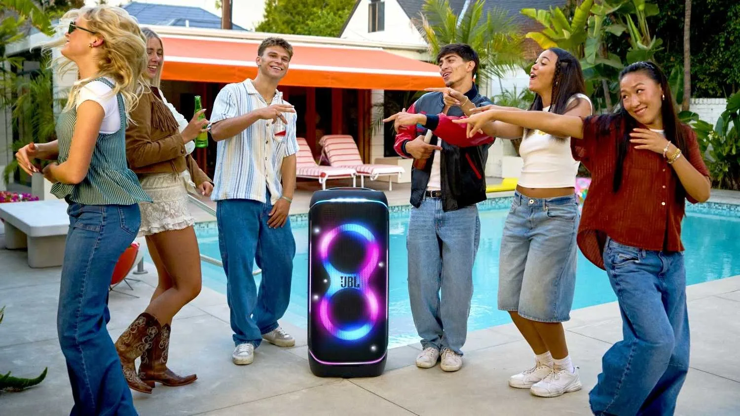 jbl partybox 720 near a pool wit