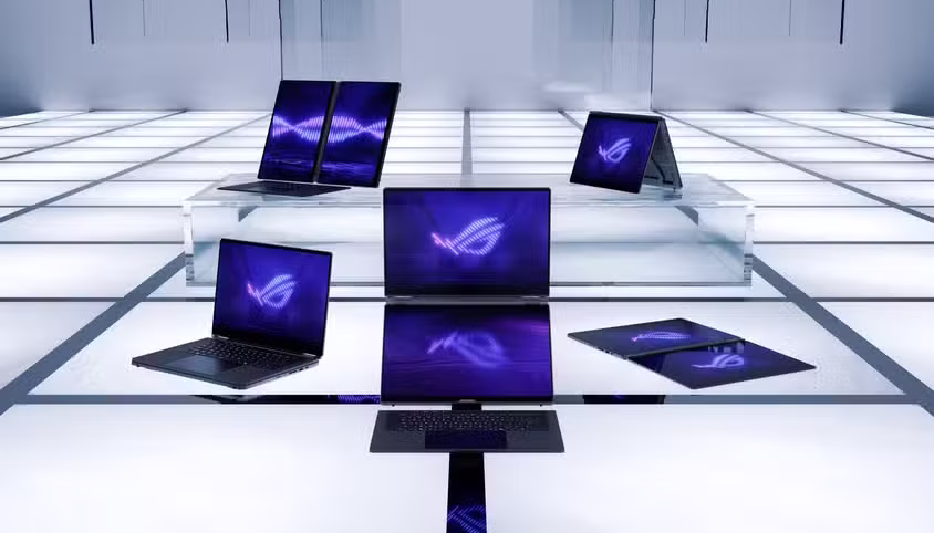 rog zephyrus duo 3k oled screen with different poses in a large room on white blocks