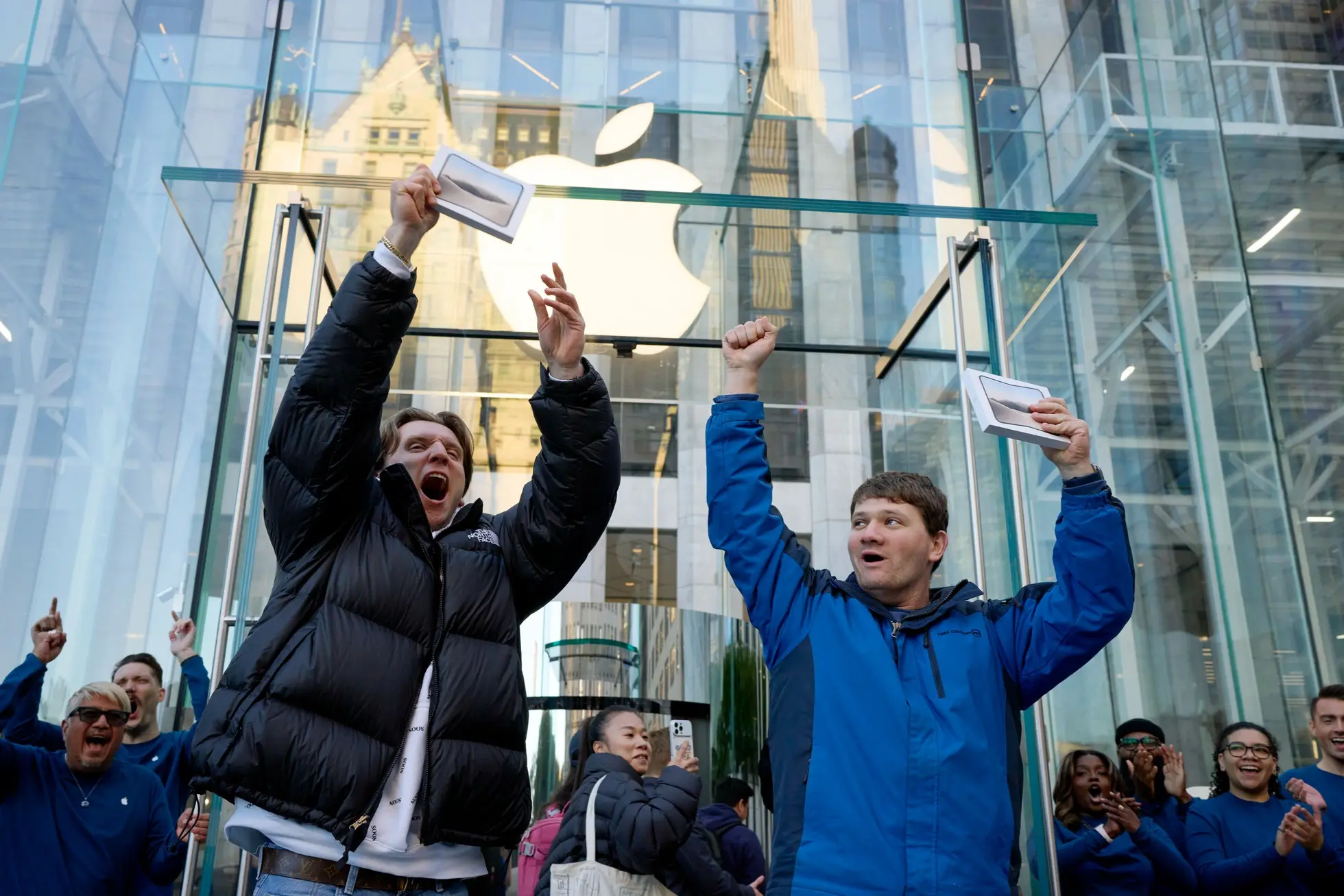 Apple Fifth Ave NYC two customers with iPhone Duo purchases